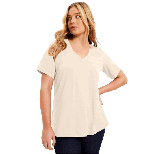 Plus-size woman wearing Pink Whisper Short-Sleeve V-Neck Tunic – relaxed fit