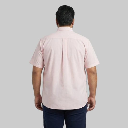 Men's pink casual short sleeve button-up shirt with a classic spread collar and front button closure laid flat on a white background.