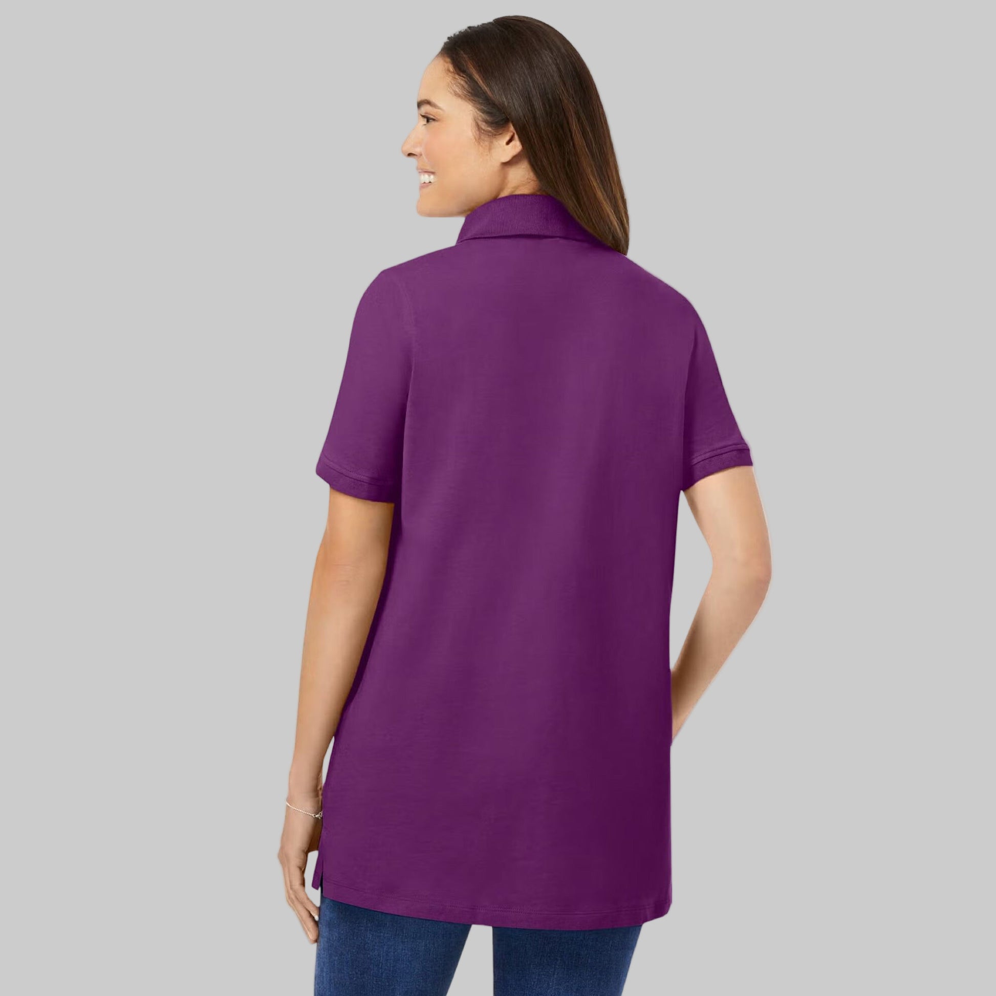 Plum purple plus-size short-sleeve polo shirt with a classic collar, relaxed fit, and 28-inch length made from soft cotton fabric.