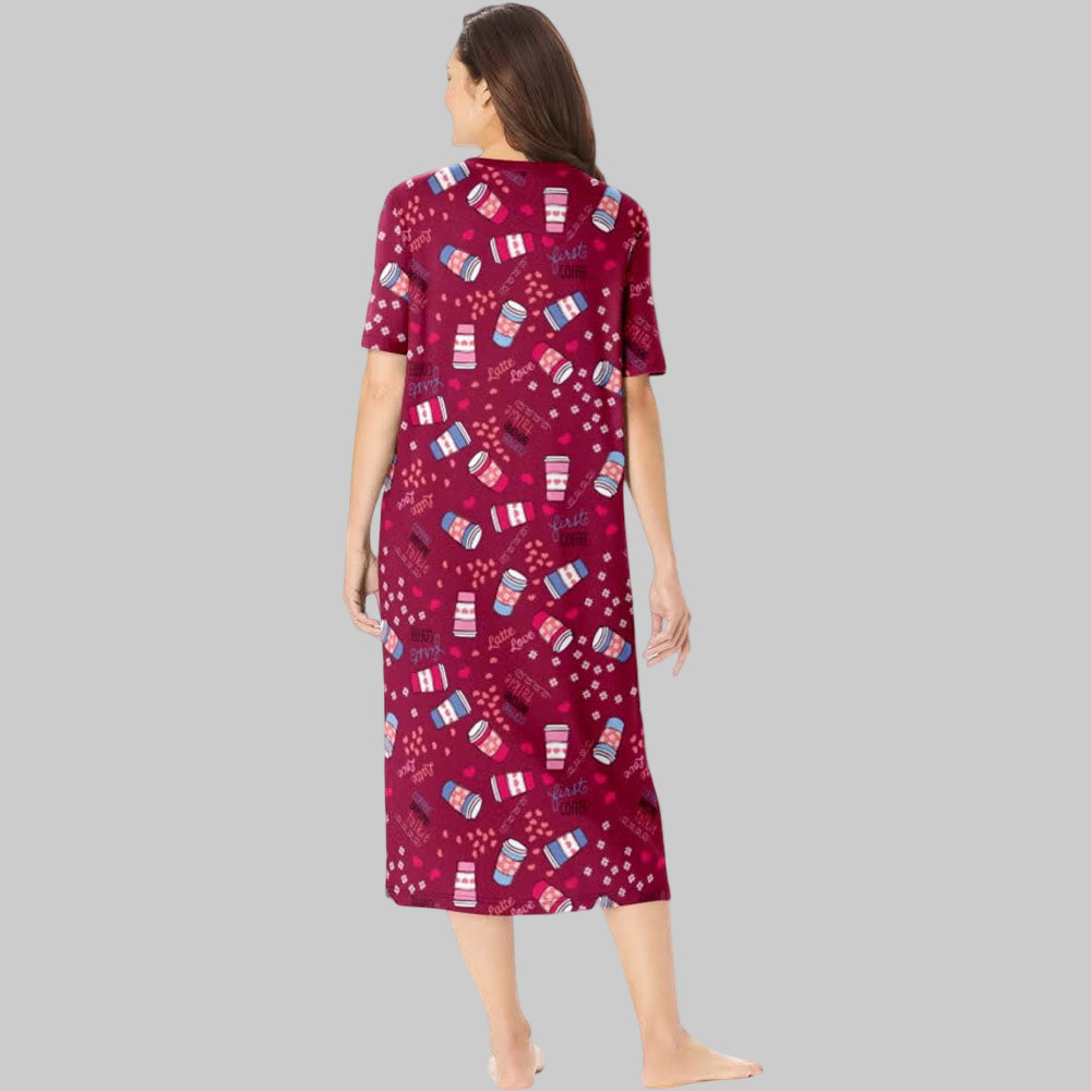 Plus size woman wearing pomegranate-colored sleepshirt with coffee cup print