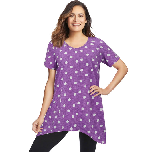 Plus size violet tunic with white polka dots, scoop neck, short sleeves, and pointed hem – relaxed cotton top for women