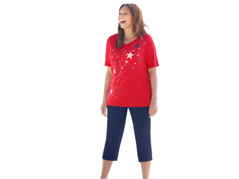 Plus size woman wearing red V-neck tee with falling stars graphic and silvertone shine