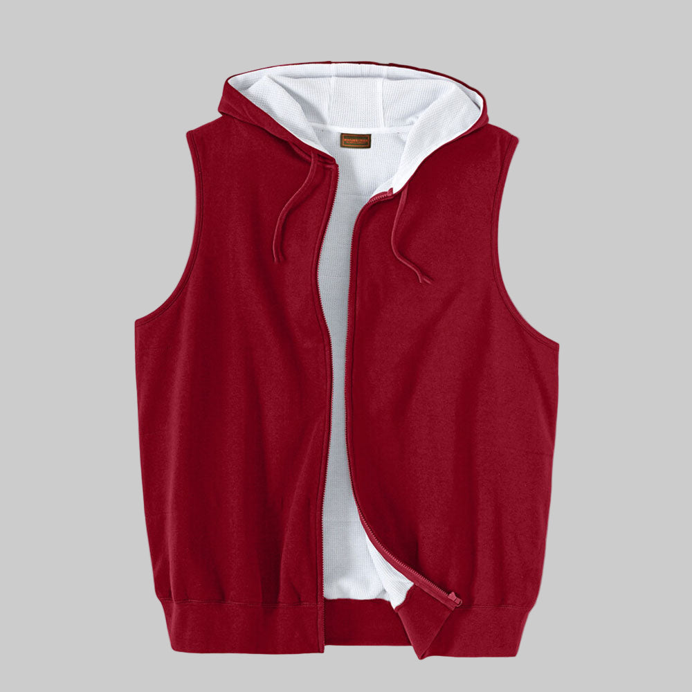 Rich burgundy thermal fleece vest hoodie with drawstring hood, sleeveless design, rib-knit waist, and zip front, made from soft cotton-poly fleece.