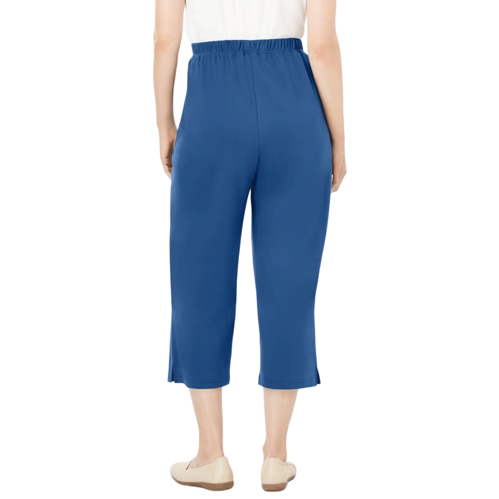 A woman wearing Royal Navy 7-Day Knit Capri Pants, designed with a relaxed fit, elastic waistband, and soft knit fabric for everyday comfort.