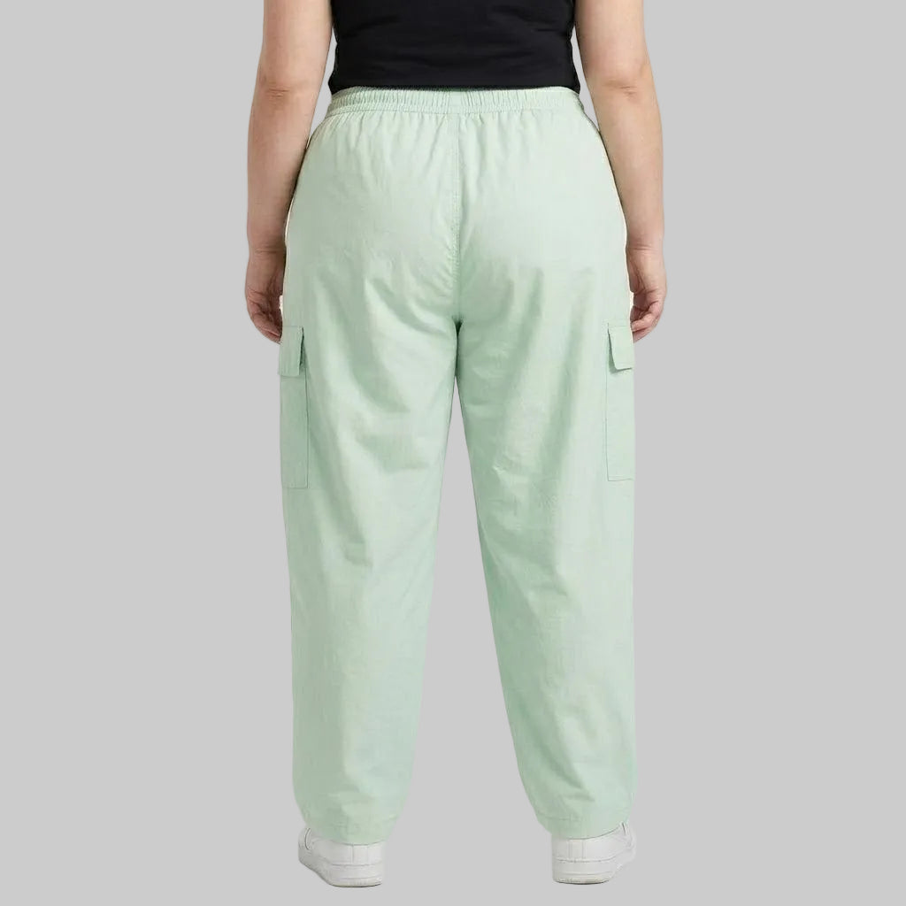 Seafoam Green Cargo Baggy Trousers in premium 98% cotton, 2% elastane twill dyed fabric featuring a relaxed baggy fit, elastic waistband, and utility cargo pockets.
