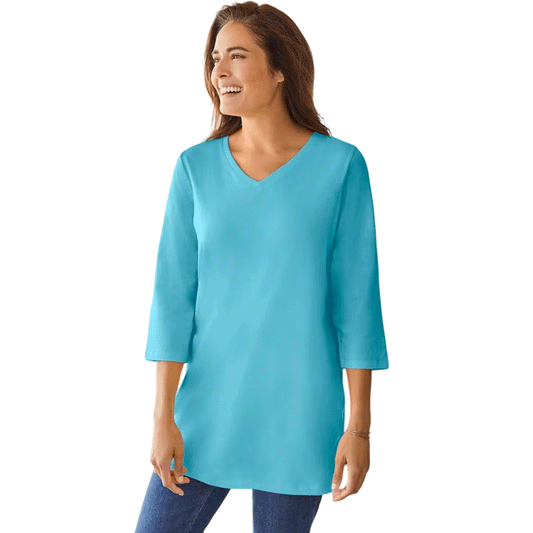 Seamist blue V-neck tunic with three-quarter sleeves, made from soft knit fabric, shown on a plus-size mannequin with a relaxed silhouette.