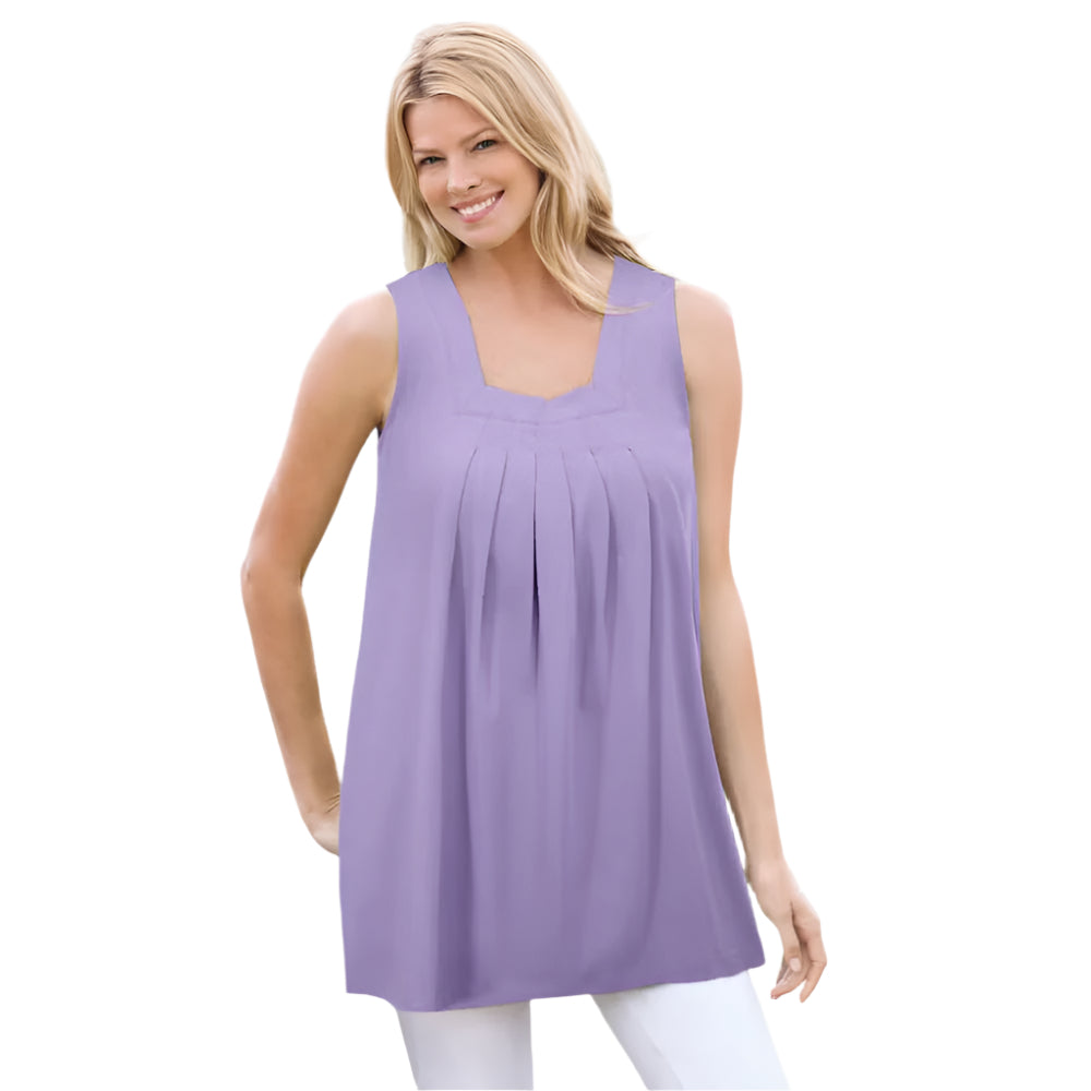 Woman wearing Soft Iris purple swing tunic with square neck, front pleats, and side pockets
