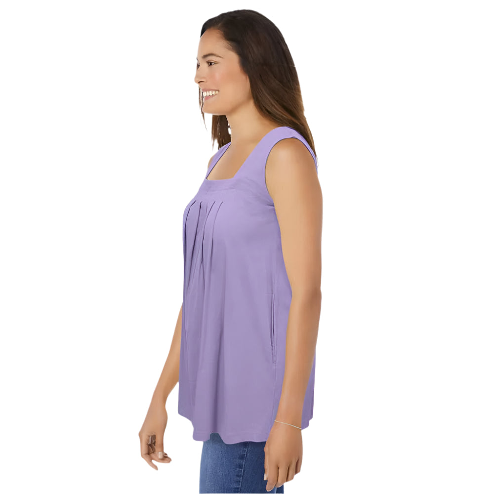 Woman wearing Soft Iris purple swing tunic with square neck, front pleats, and side pockets
