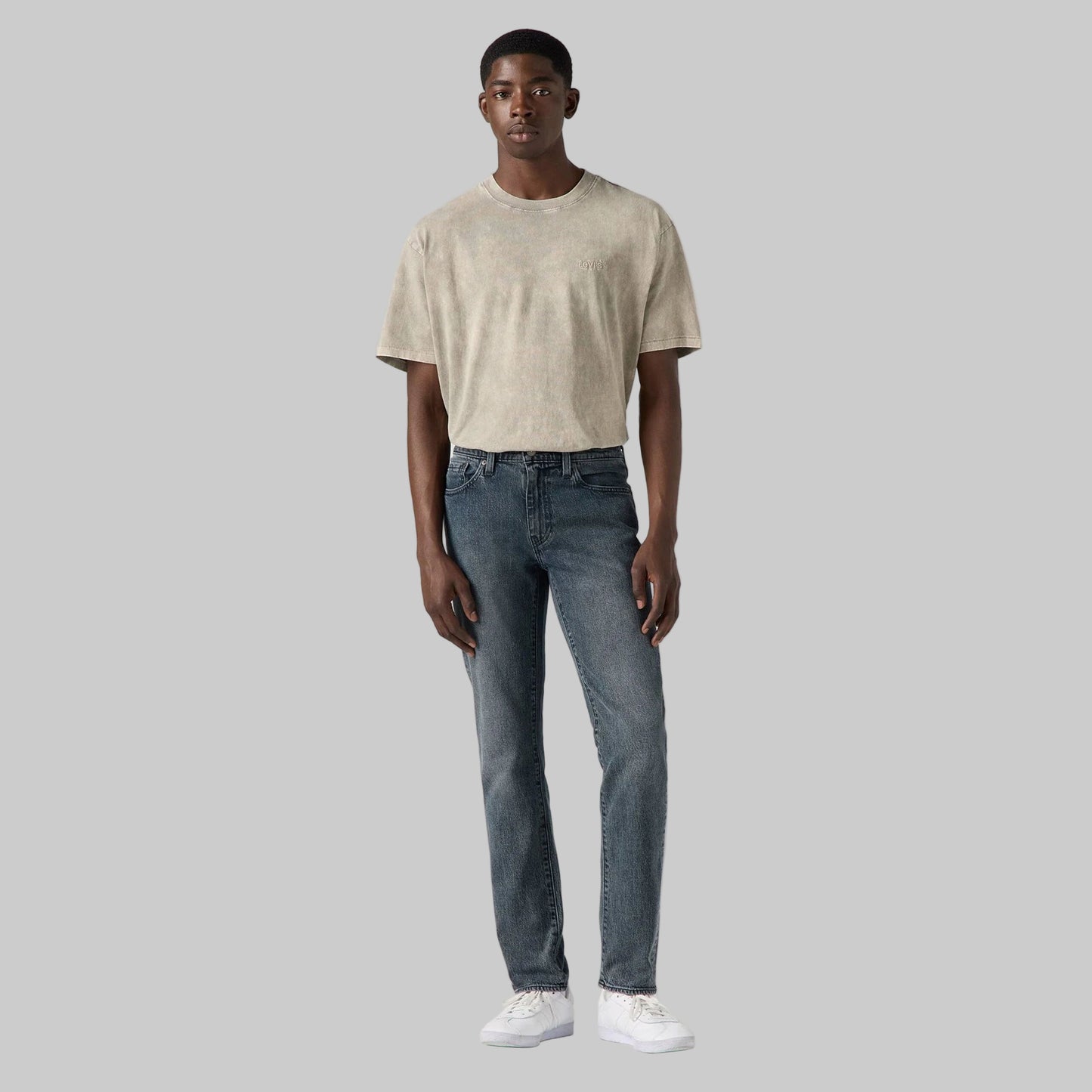 Full-length flat lay of Stone Grey Slim Straight Jeans in stone grey wash