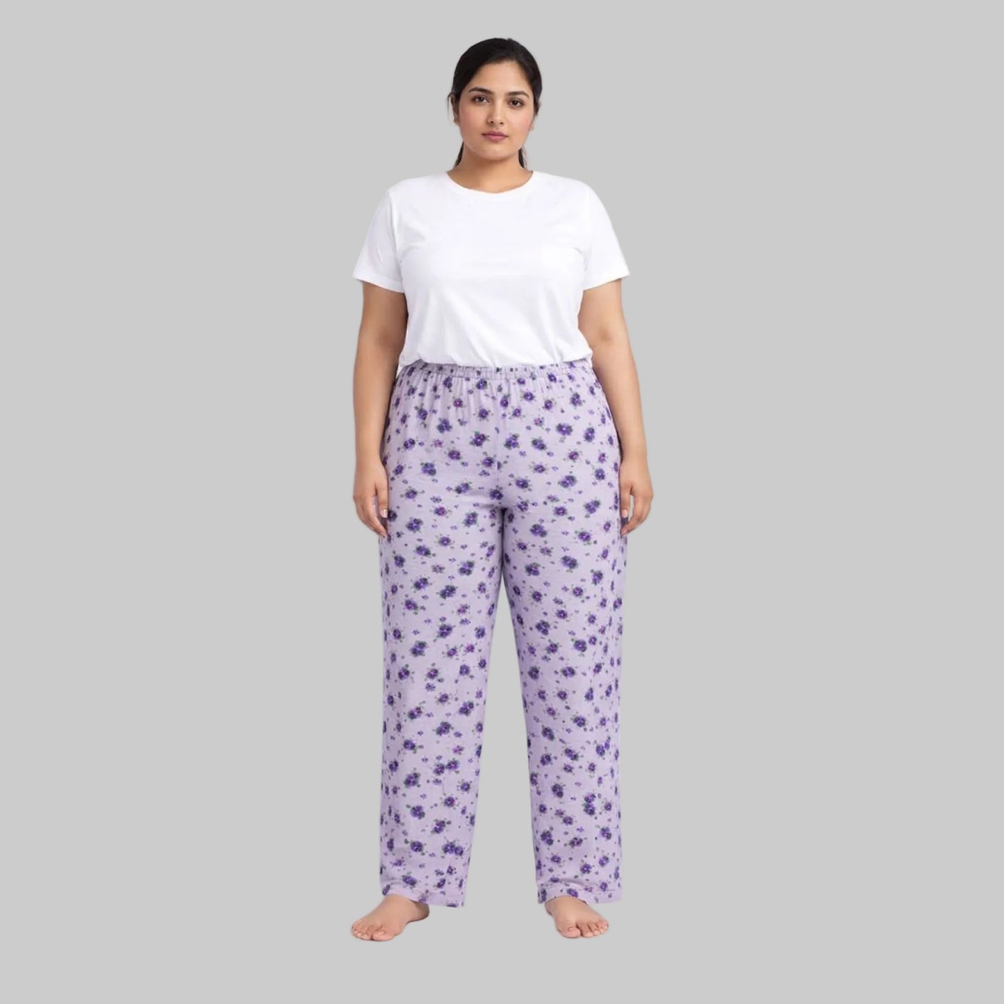 Violet floral printed cotton flannel pajama pants with elastic waistband laid flat