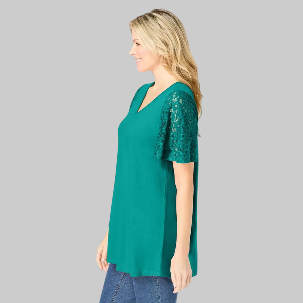 Plus-size tunic with lace flutter sleeves, a curved V-neckline, and a relaxed swingy fit. Made from a soft cotton/poly blend for comfort and style