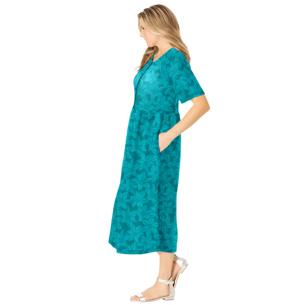 Woman wearing soft blue floral button-front dress with elbow sleeves and flowing skirt