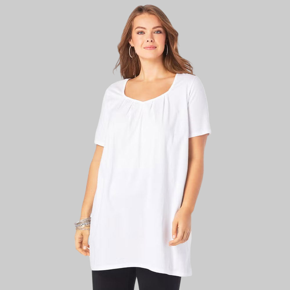 Plus-size tunic with a pleated sweetheart neckline, swing silhouette, and a 34” length. Made from breathable cotton knit for effortless style and comfort.