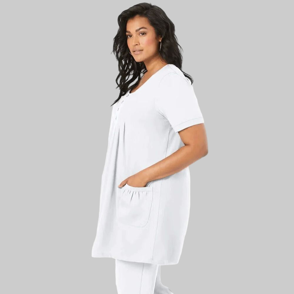 White Plus Size Women Two Pocket Soft Knit Tunic with a scoop neckline, short sleeves, and a relaxed fit for casual or layered styling.