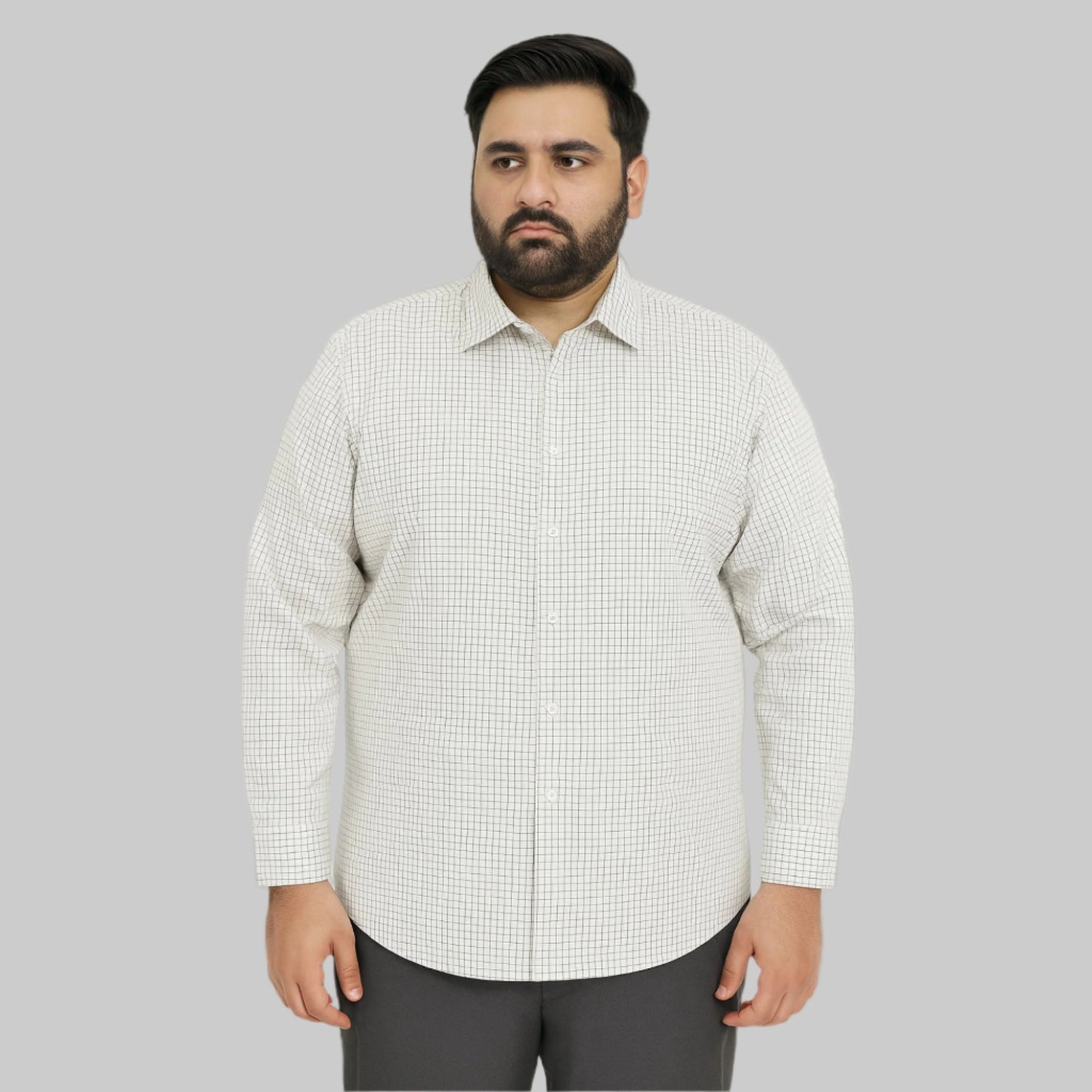 Plus-size Pakistani man wearing white shirt with small black grid check pattern