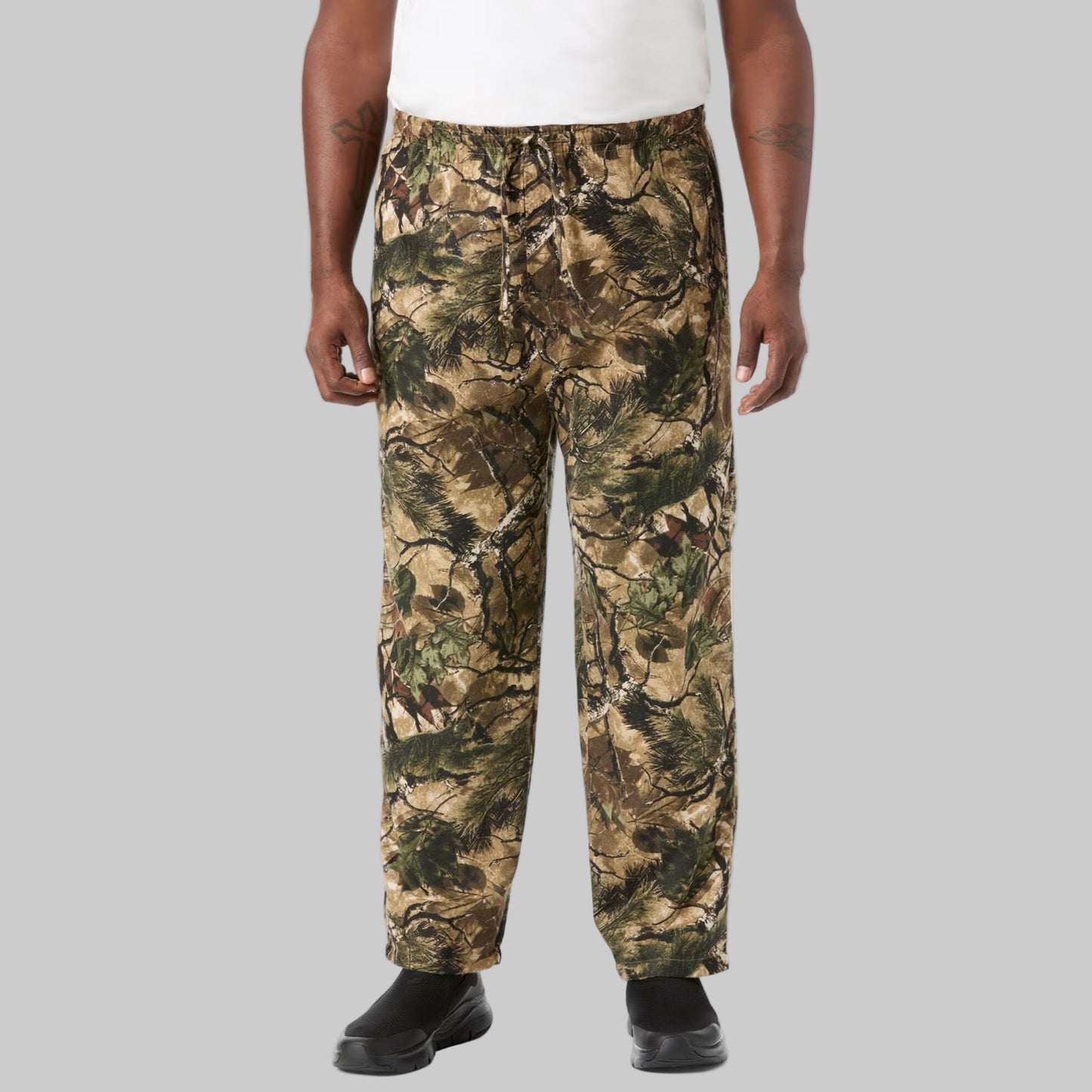 Men’s Wood Camo flannel pajama pants with elastic waistband, drawstring, button fly, side pockets, and camo print.