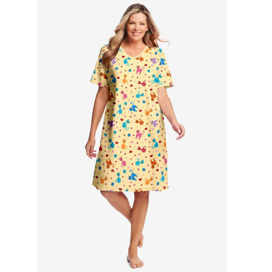 Plus size yellow playful print short sleepshirt in breathable cotton with V-neck, relaxed fit, and 40" coverage.