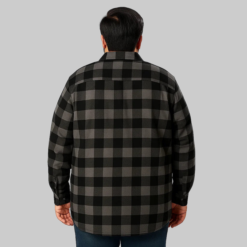 Plus-size male model wearing navy buffalo plaid fleece-lined shirt jacket without hood, front view, studio background.