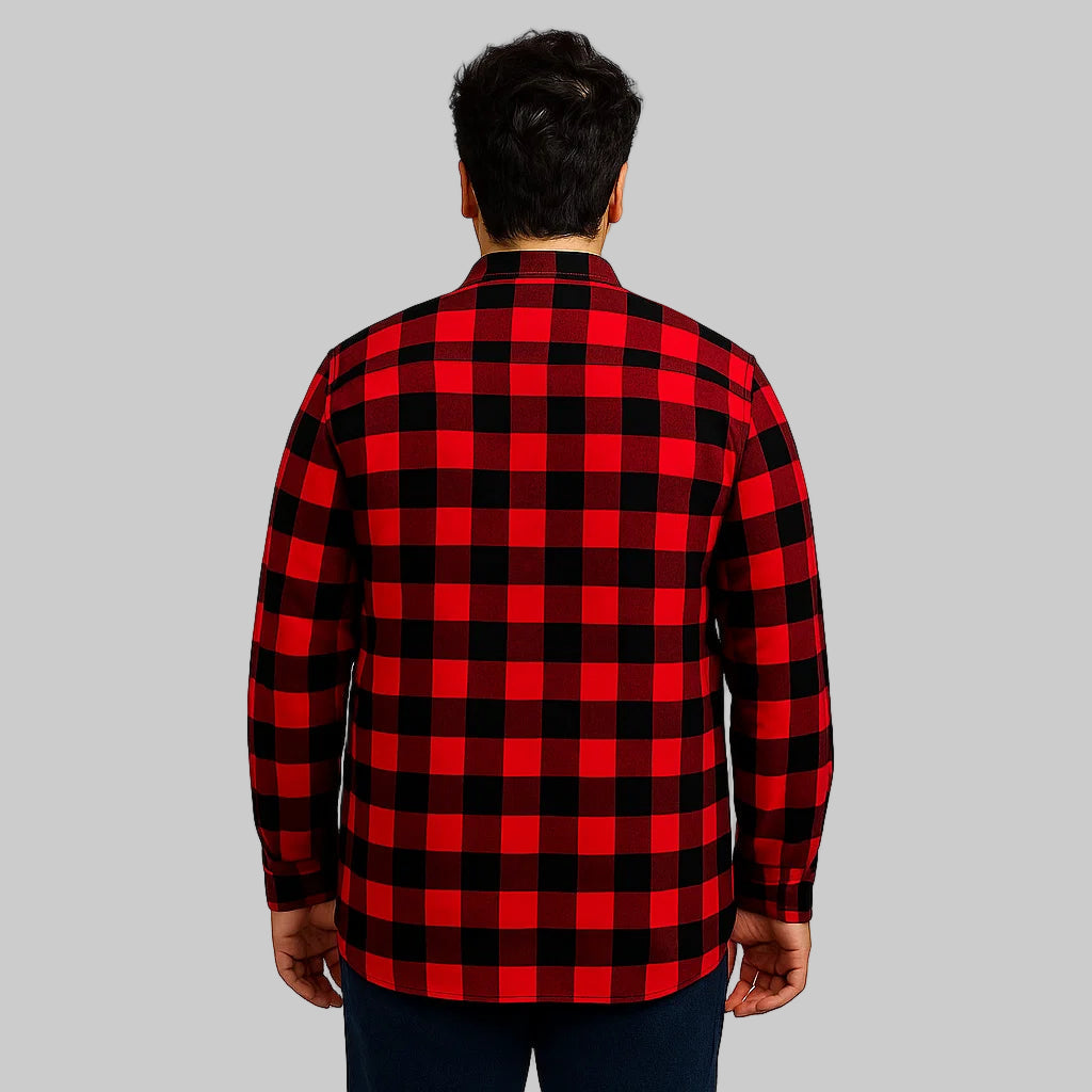 Plus-size man wearing a red buffalo check flannel sherpa-lined shirt with button front and chest pockets, photographed on a clean white studio background.