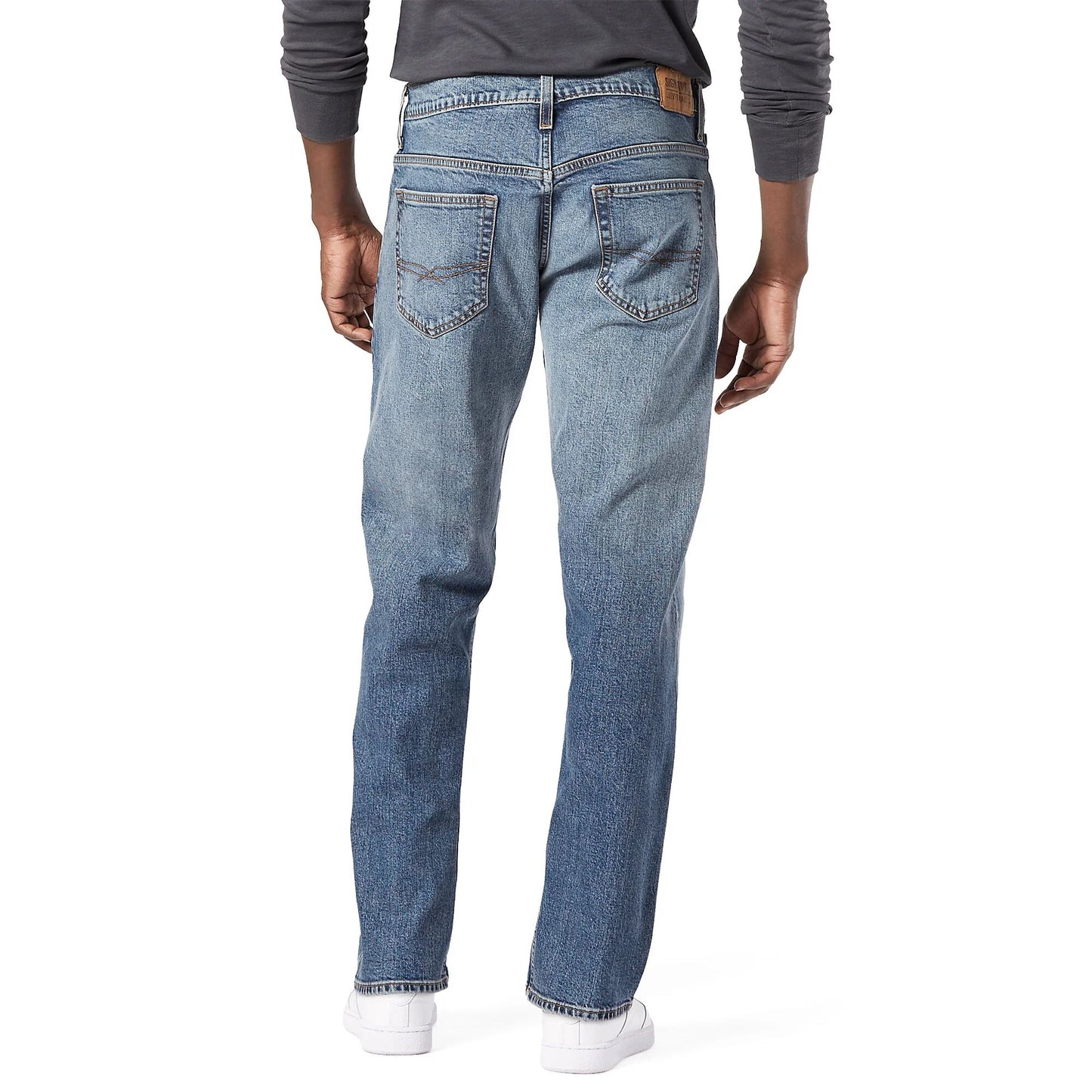 Full-length flat lay of Flying Strauss Signature Loose Fit Jeans in light wash
