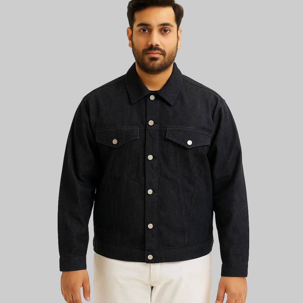 Man wearing black denim classic fit jacket with chest pockets and button-down front