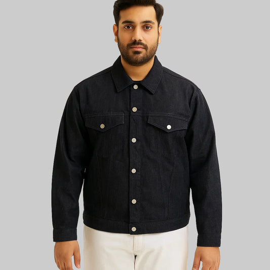 Man wearing black denim classic fit jacket with chest pockets and button-down front