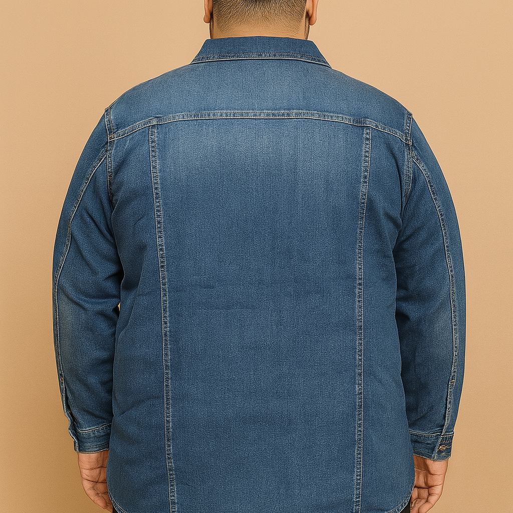 Plus-size man wearing classic blue denim jacket with button front and chest pockets