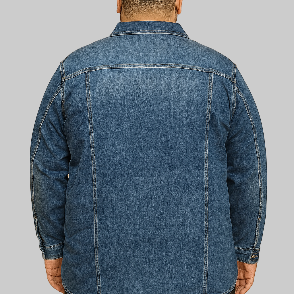 Plus-size man wearing classic blue denim jacket with button front and chest pockets
