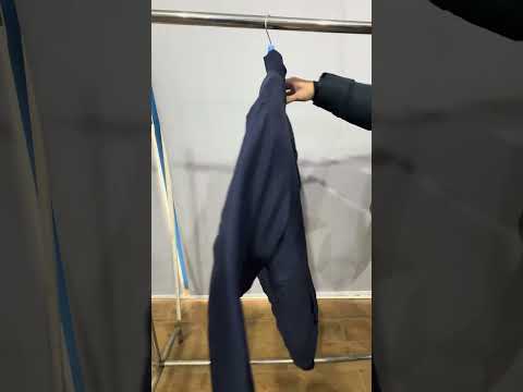 Navy blue plus size bomber jacket with front zip closure and ribbed cuffs on a clean background.