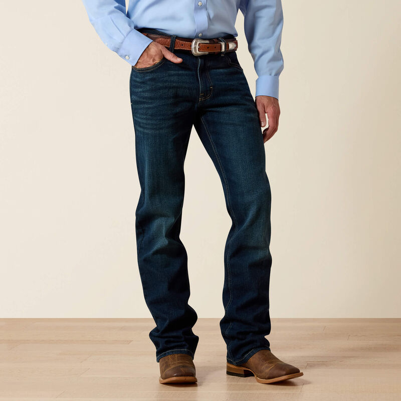 Indigo Slim Stretch Straight Leg Jean — stretch denim, straight through thigh, hand-sanded finish, zipper fly.