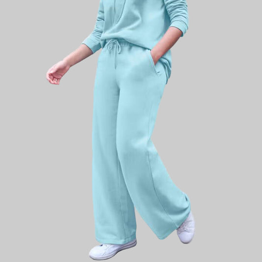 Plus-size Aqua Sky wide leg fleece sweatpants with drawstring waist and side pockets, displayed flat on a white background.