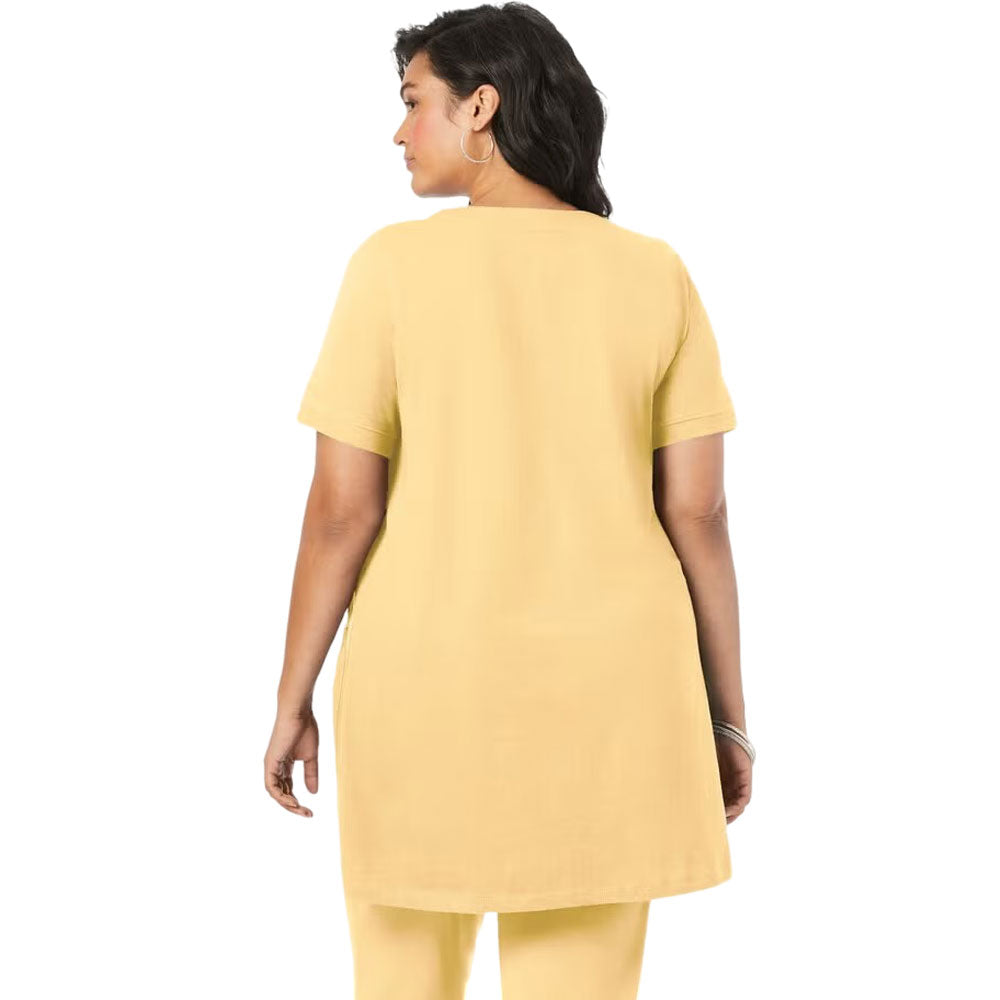 Banana yellow knit tunic with two front pockets and crew neckline