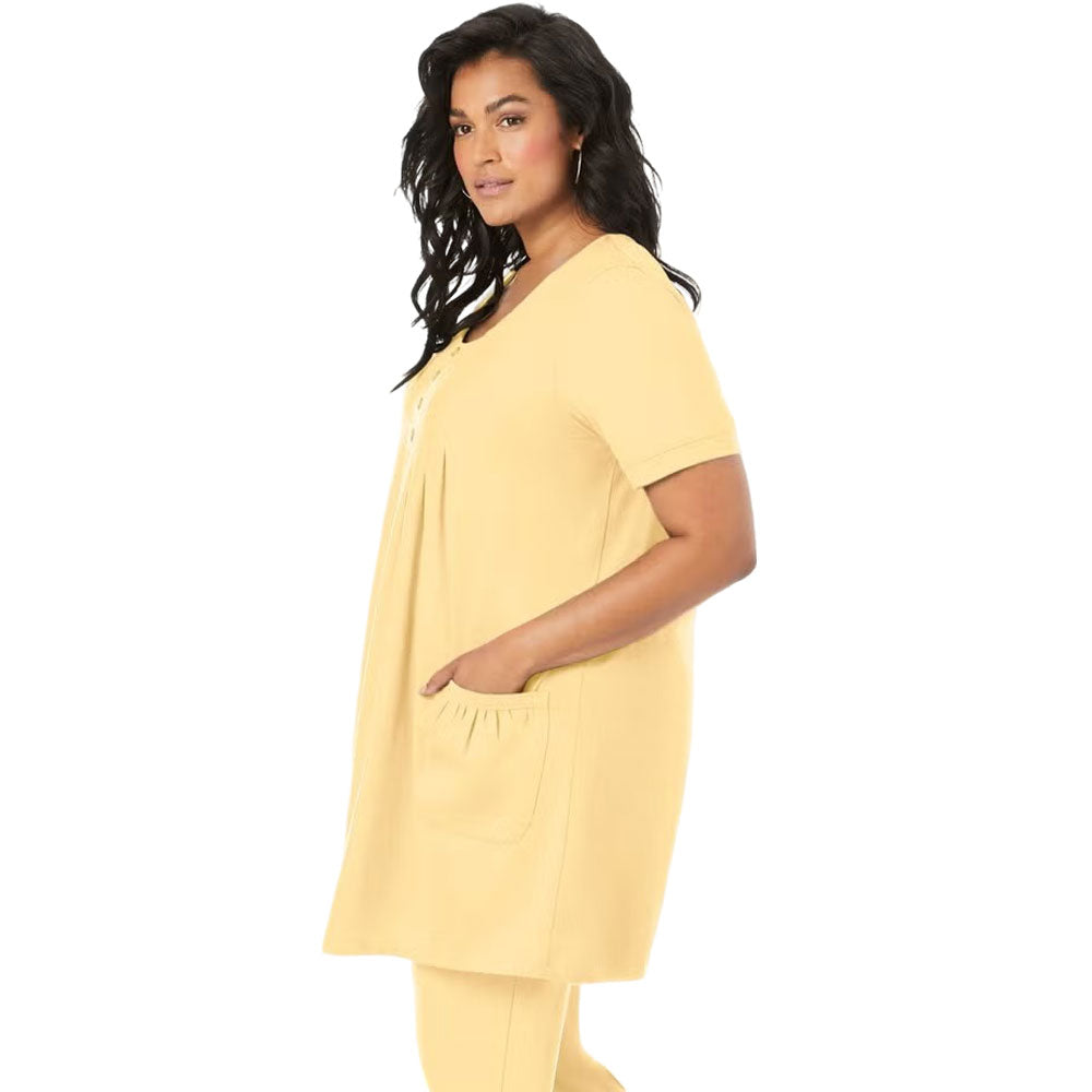 Banana yellow knit tunic with two front pockets and crew neckline