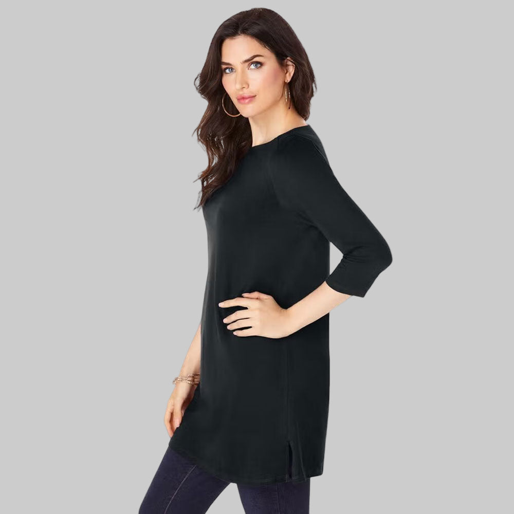 Plus-size flowy tunic with three-quarter sleeves, side slits, and a 34” length. Crafted from breathable cotton knit for everyday comfort and style.