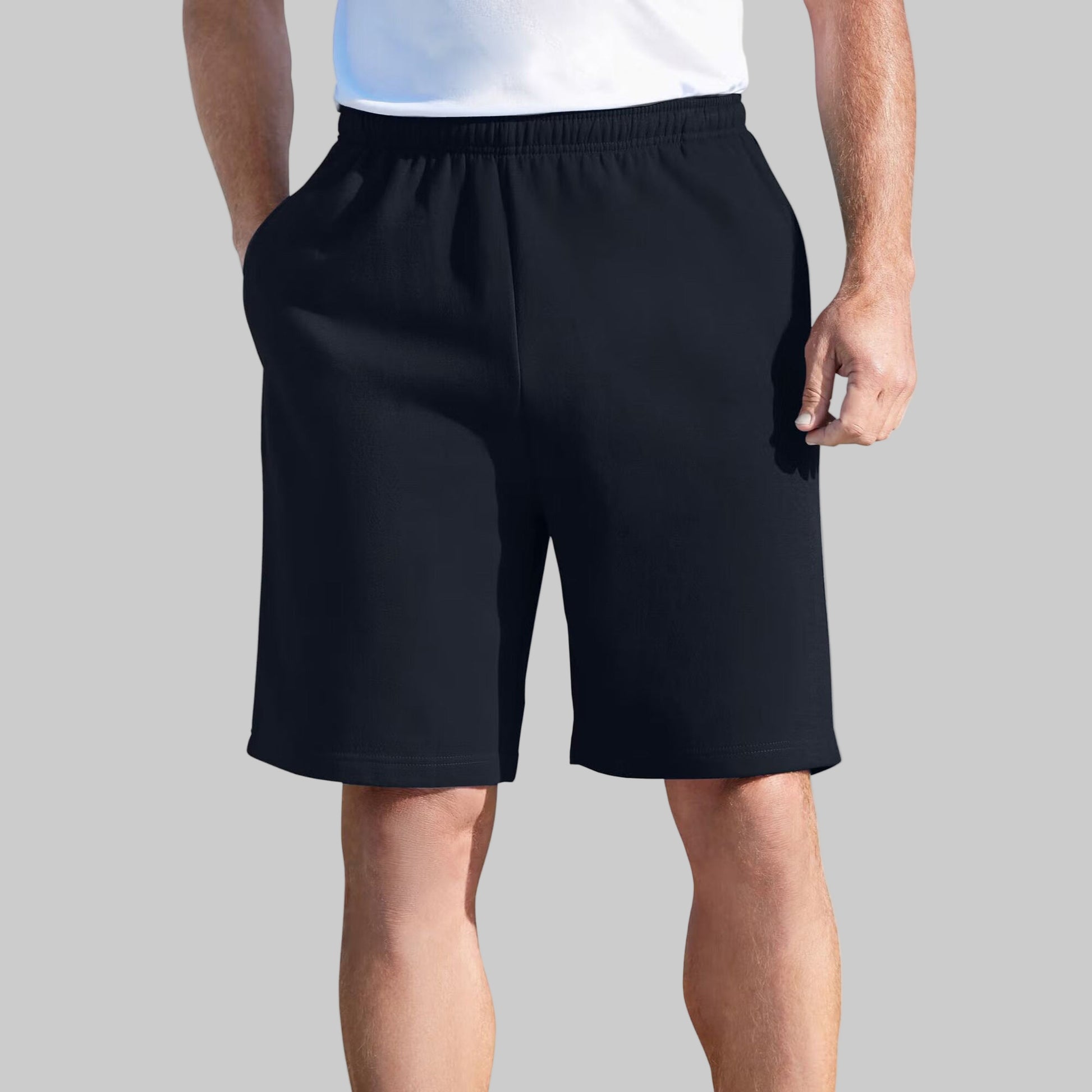 Black fleece big size shorts with drawstring waist and pockets displayed on a clean studio background.