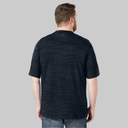 Plus-size Pakistani male model wearing black marl crewneck T-shirt on a clean studio background, relaxed fit.