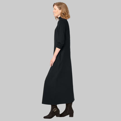 Plus-size model wearing Black Mockneck Dress with long sleeves