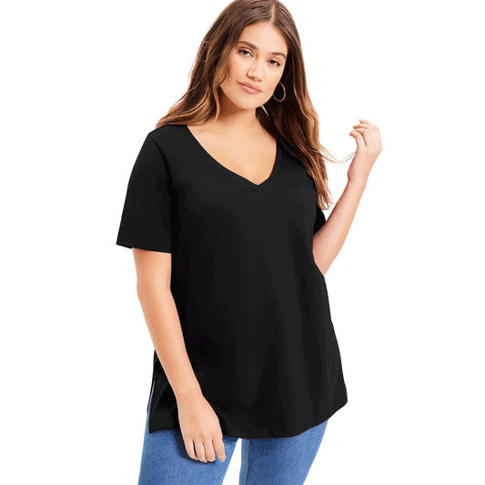 Woman wearing black short-sleeve V-neck tunic with relaxed fit