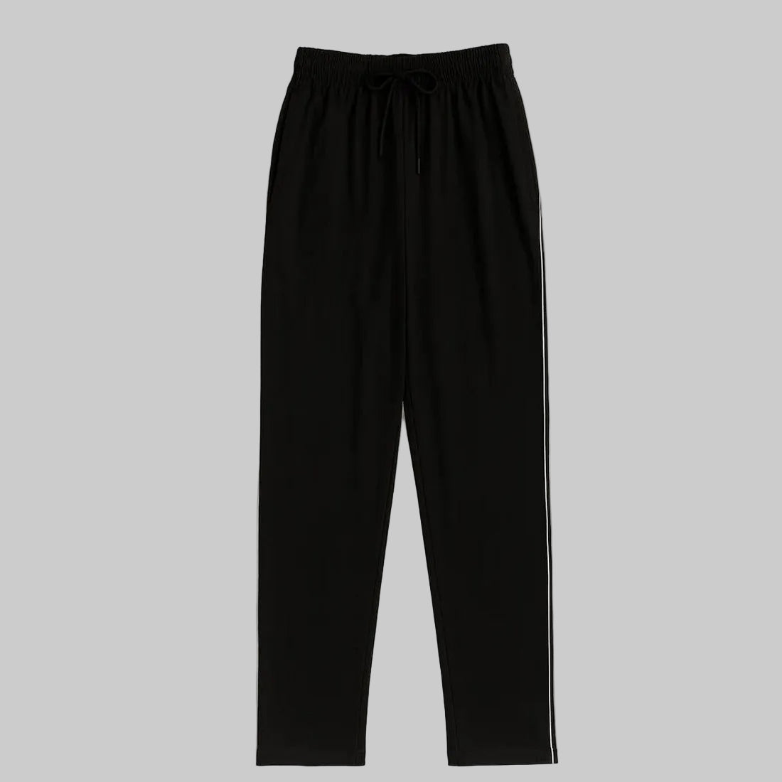 Black plus-size jogger trousers with subtle side stripe, worn by a 2XL Pakistani male model on a clean white background.