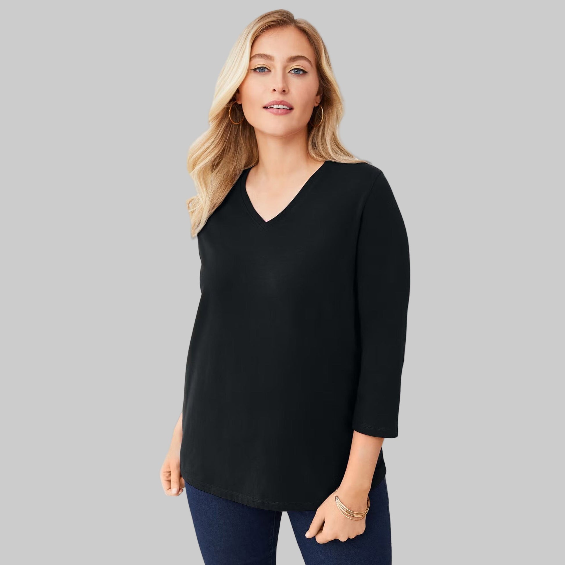 Women’s black stretch cotton V-neck tee with three-quarter sleeves and relaxed fit, displayed on a clean studio background.