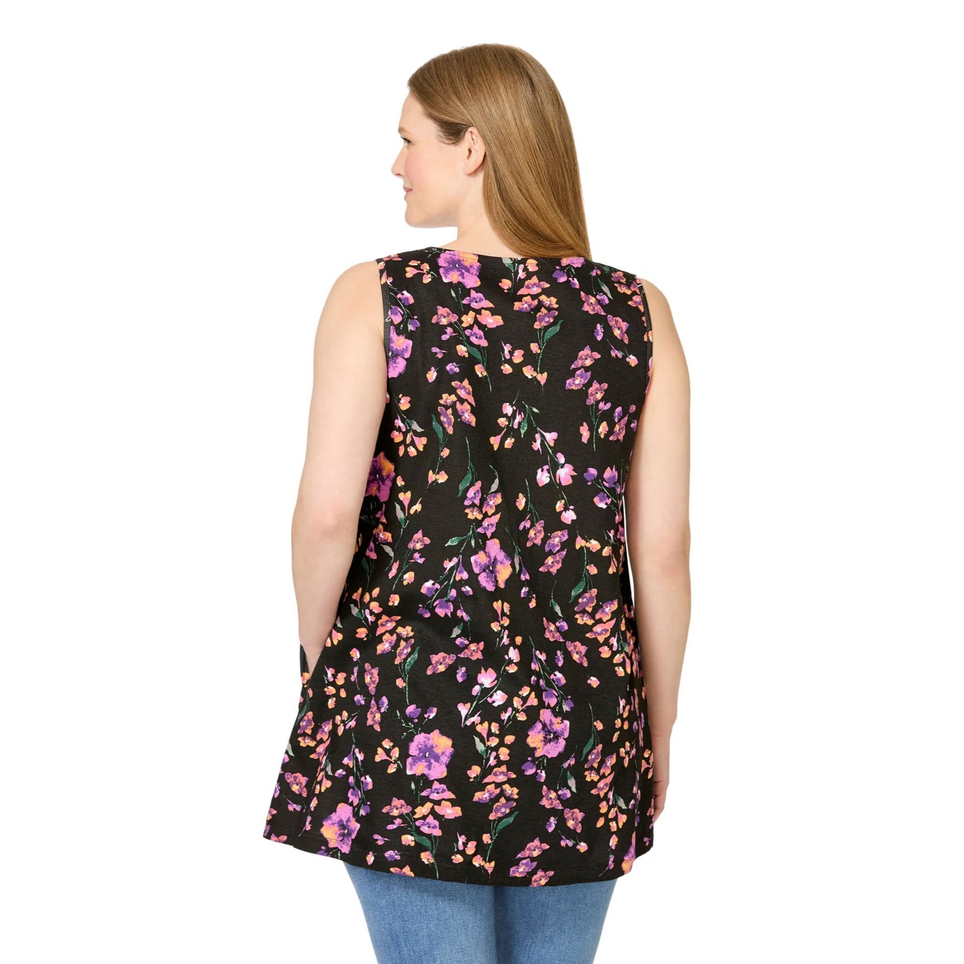 Woman wearing black square neck swing tunic with front pleats and side pockets
