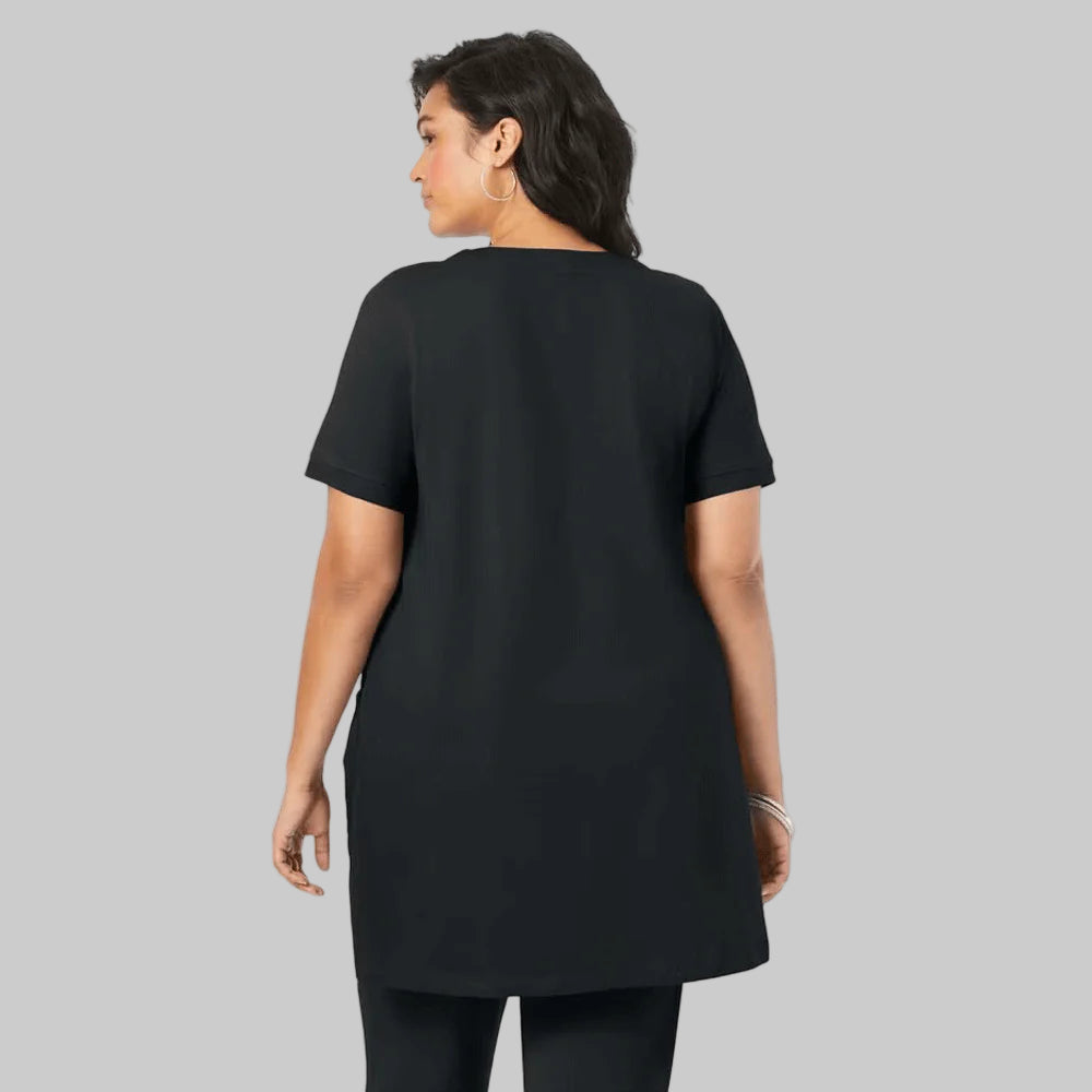 Black Two Pocket Soft Knit Tunic with long sleeves, scoop neckline, and a relaxed fit, perfect for layering or casual wear.