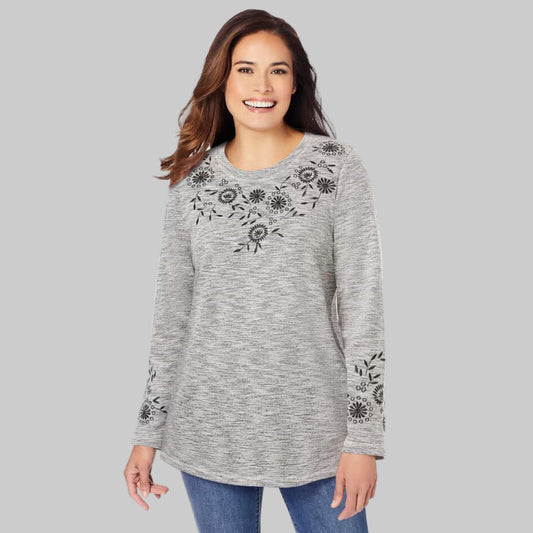 Black marled floral embroidered sweatshirt tee with scoop neckline and side slits, made from soft French terry cotton blend.