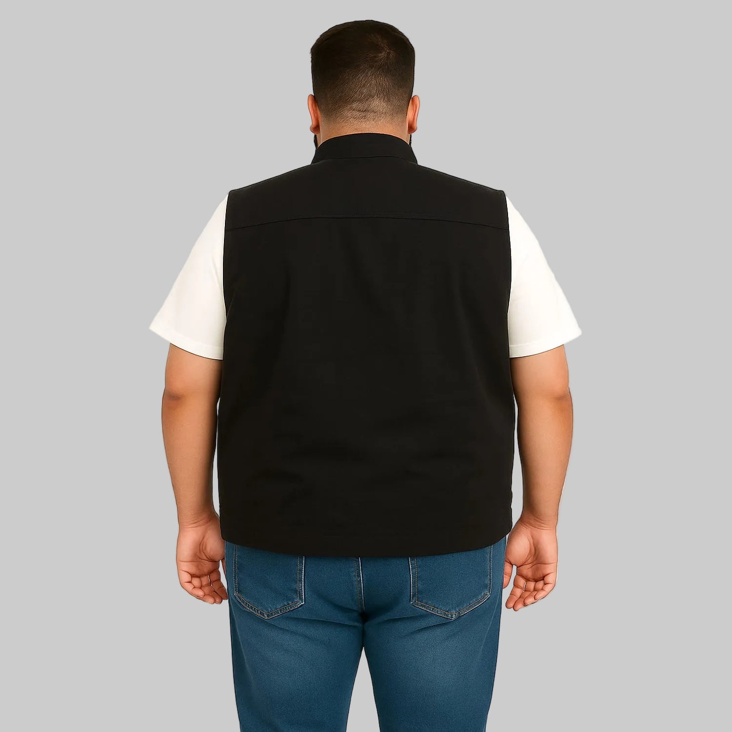 Men’s black twill cotton sleeveless jacket, lightweight layering vest, front studio view