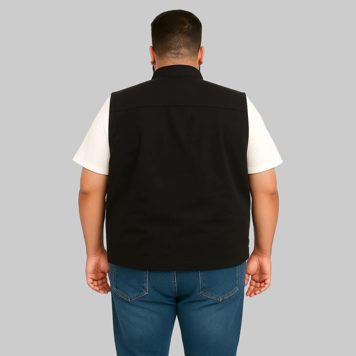 Men’s black twill cotton sleeveless jacket, lightweight layering vest, front studio view