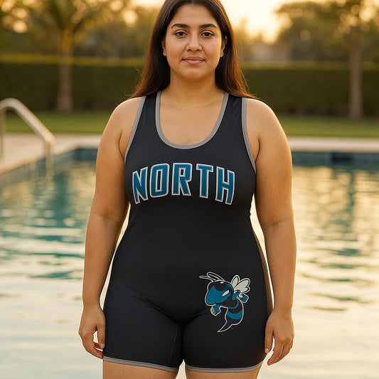 Plus-size Pakistani woman wearing NORTH one-piece swimsuit with short legs and graphic print, modest sleeveless swimming dress in regular size