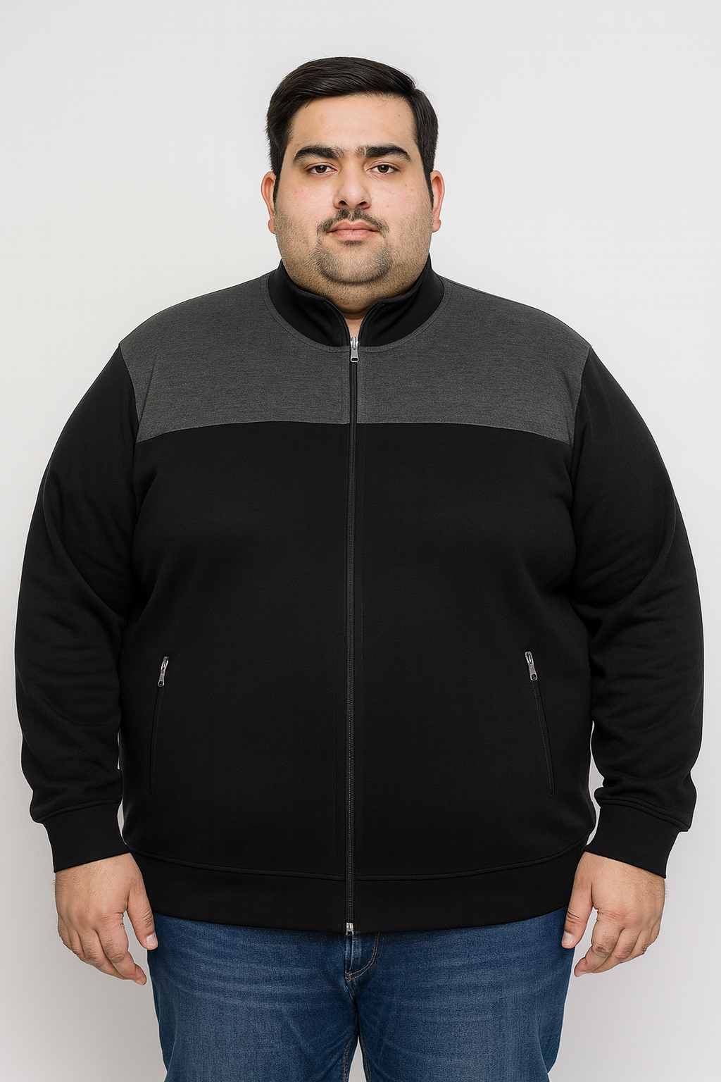 Plus-size Pakistani male model wearing Black & Charcoal Fleece Zip-Up Jacket, front view.