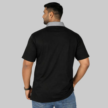 Plus size male model wearing black polo shirt with grey contrast collar front view