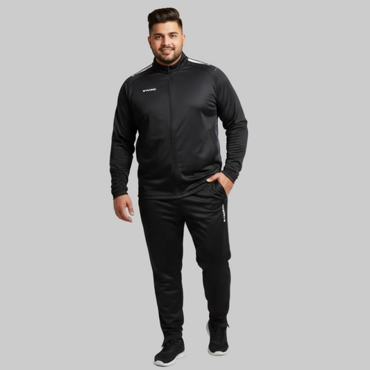Men’s black activewear tracksuit with full zip jacket and slim fit trousers on a gray background
