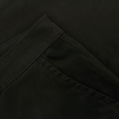 "Men’s black cotton stretch chino pants with slim straight leg, button and zip closure, belt loops, front hand pockets, and rear button-fastened pockets."